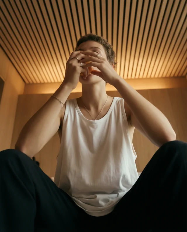 Cozy Mockup of Young Adult in White Tank Top