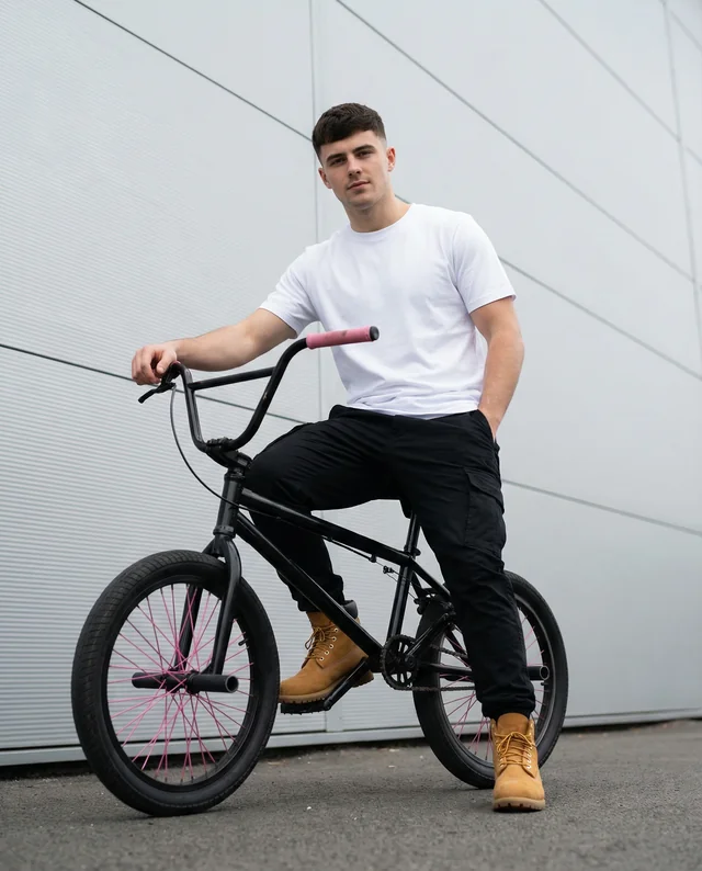 Youthful BMX Cyclist T-Shirt Mockup for Urban Style