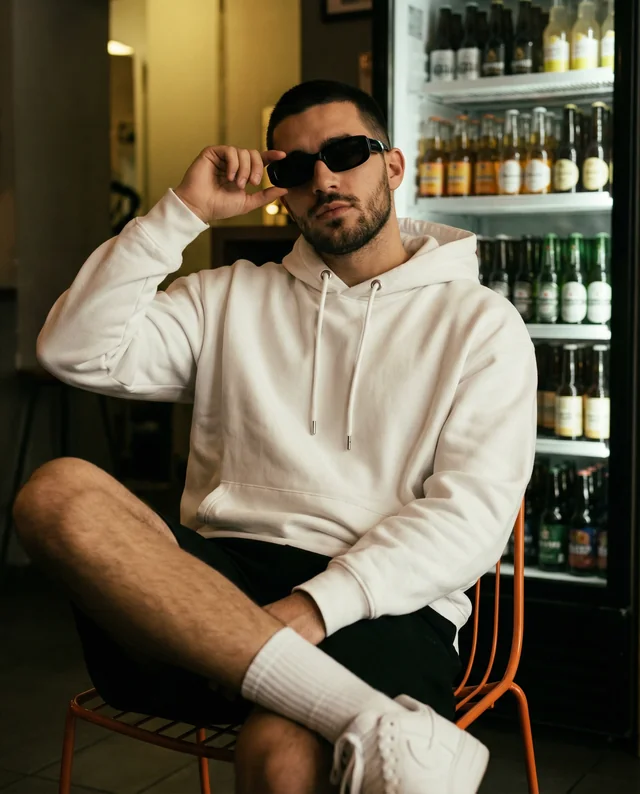 Stylish Hoodie Mockup in a Vibrant Café Setting