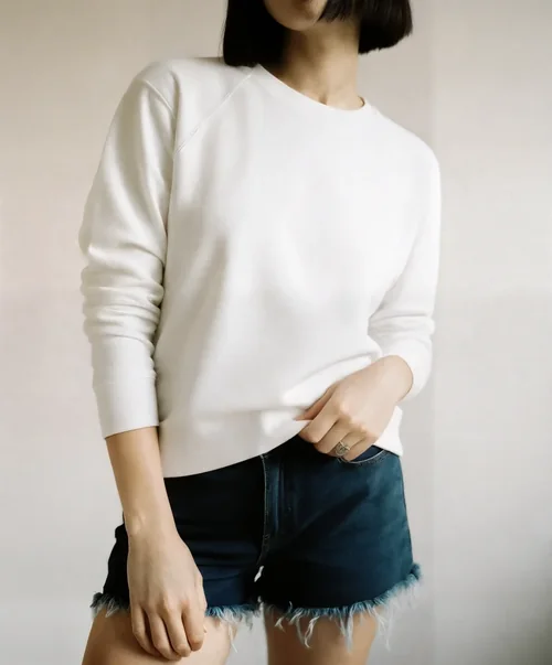 Stylish Sweatshirt Mockup of a Confident Young Woman