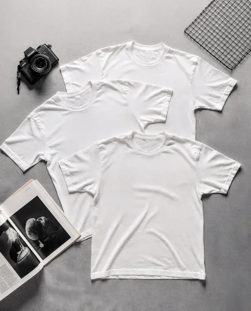 Minimalist T-Shirt Mockup with Vintage Camera and Magazine