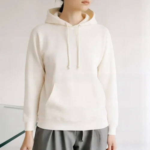 Cozy Mockup of a Young Woman in a Cream Hoodie