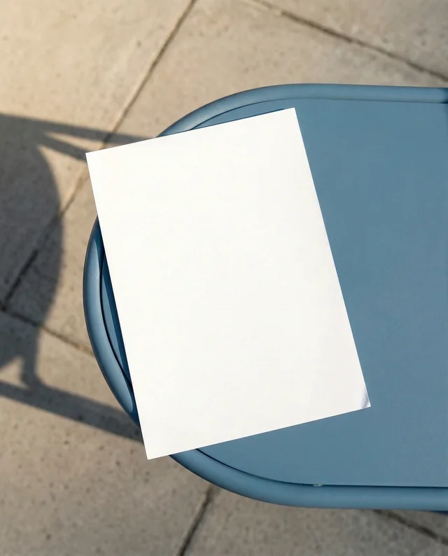 Blank Flyer Mockup on Modern Blue Round Table Outdoors