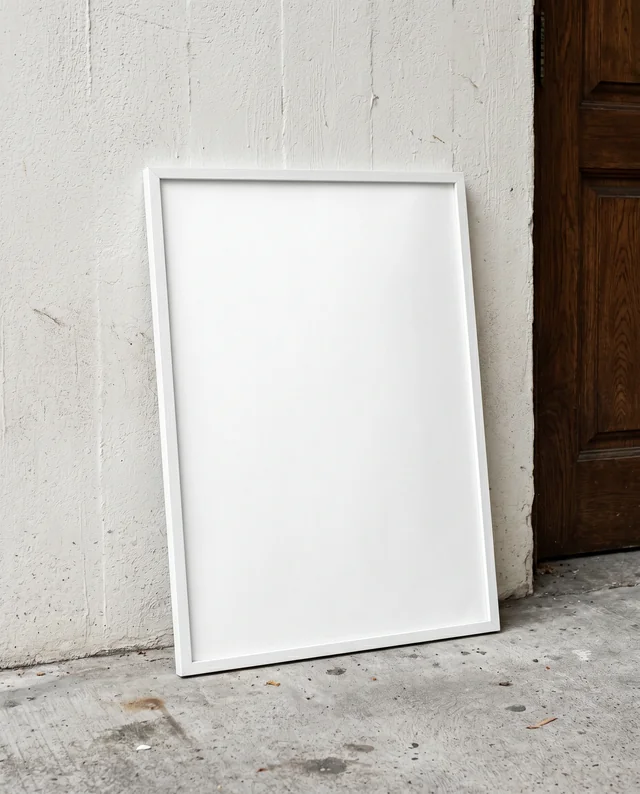 Minimalist Poster Mockup with White Frame and Gray Wall