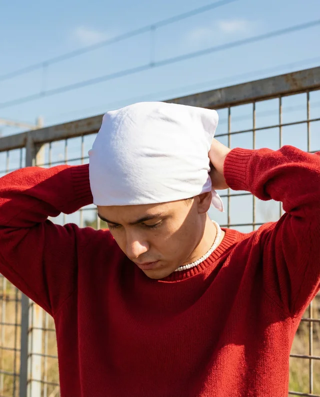 Young Man in White Bandana and Red Sweater Mockup