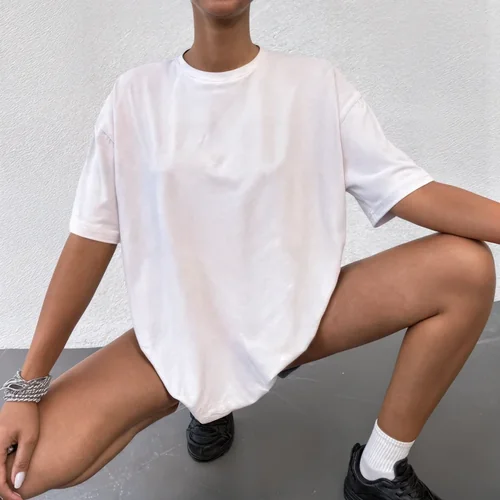 Mockup of Oversized T-Shirt Against Light Background