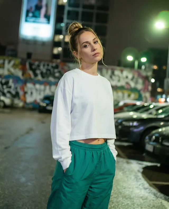 Urban Night Mockup of Woman in Crop Top and Sweatpants