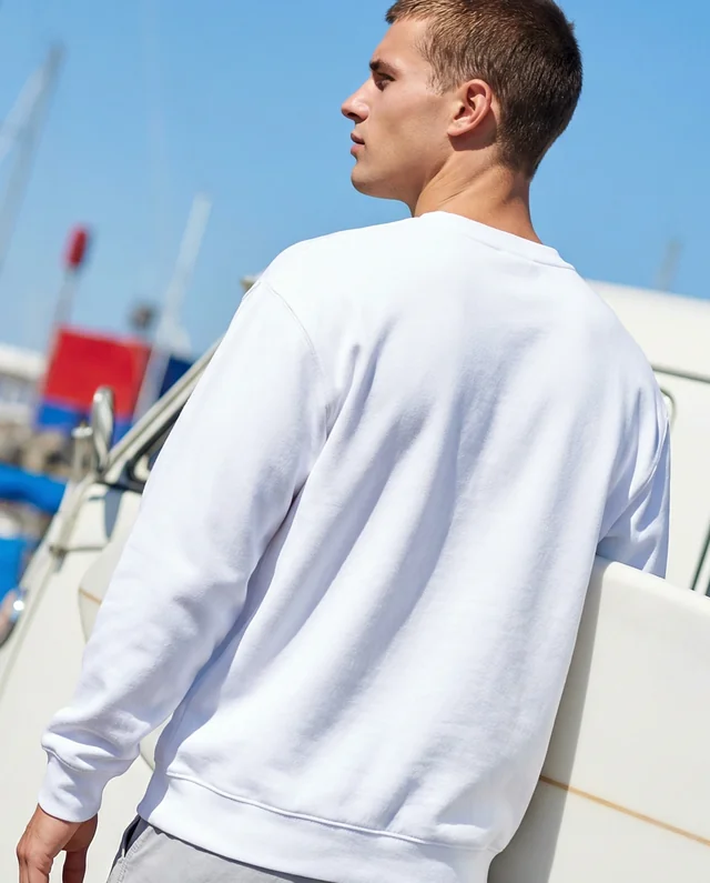 Stylish Mockup of a Young Man in a Sweatshirt Outdoors