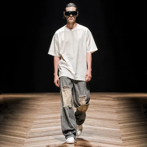 Stylish T-Shirt Mockup with Dark Background and Soft Colors