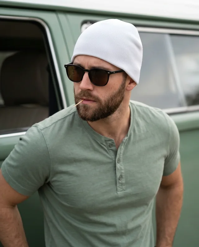 Stylish Beanie Mockup with Rugged Man by Vintage Van