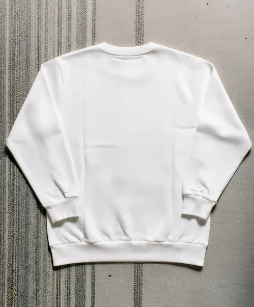 Mockup of Classic White Sweatshirt on Textured Surface