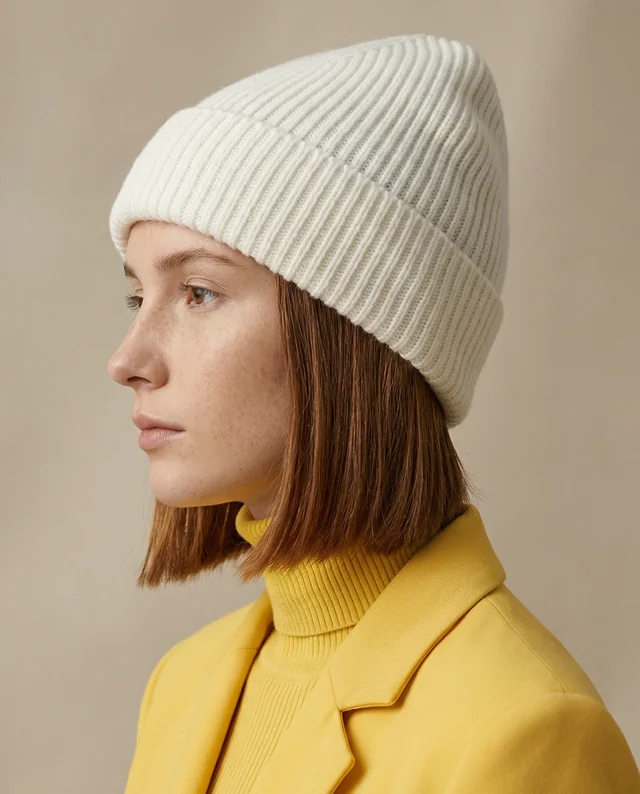 Profile Mockup of Woman in White Beanie and Yellow Sweater