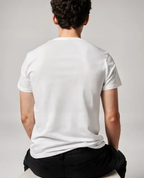 Stylish T-Shirt Mockup of a Young Man in Casual Setting