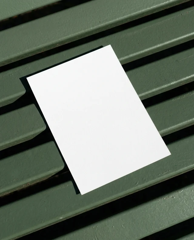Modern Mockup of a Flyer on a Textured Green Surface