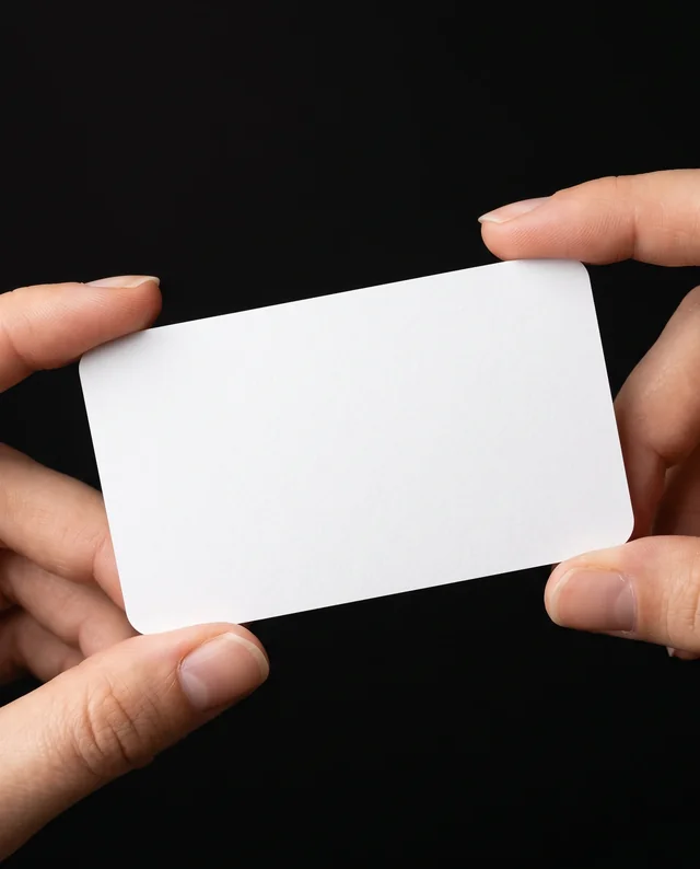 Elegant Business Card Mockup with Hands on Black Background