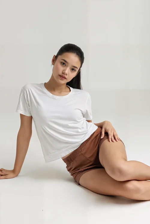 Mockup of T-Shirt on Smooth Gray Background with Colors