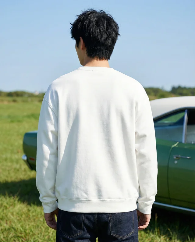 Stylish Sweatshirt Mockup in a Lush Green Field