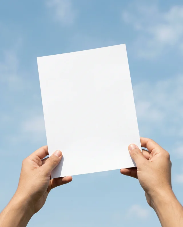 Elegant Mockup of a Flyer Against a Bright Blue Sky