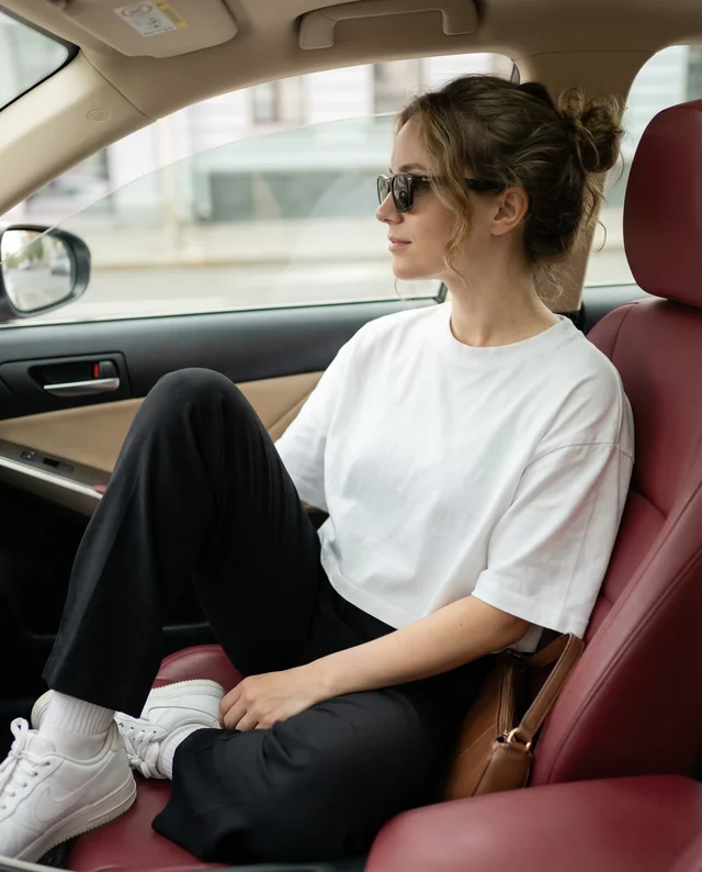 Stylish Woman in Crop Top Mockup Inside Modern Car