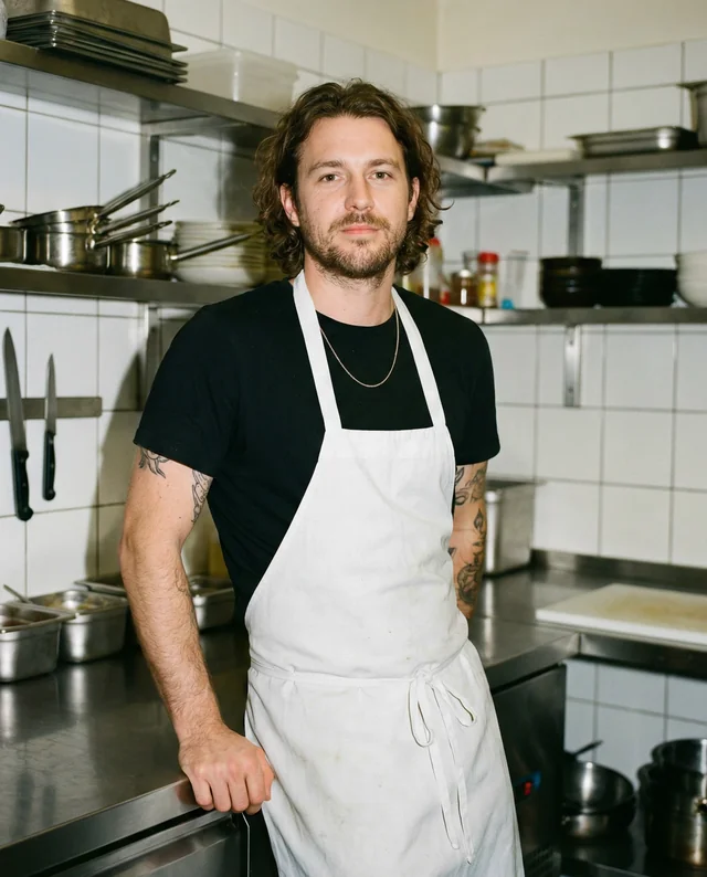 Confident Male Chef Mockup in Professional Kitchen Setting