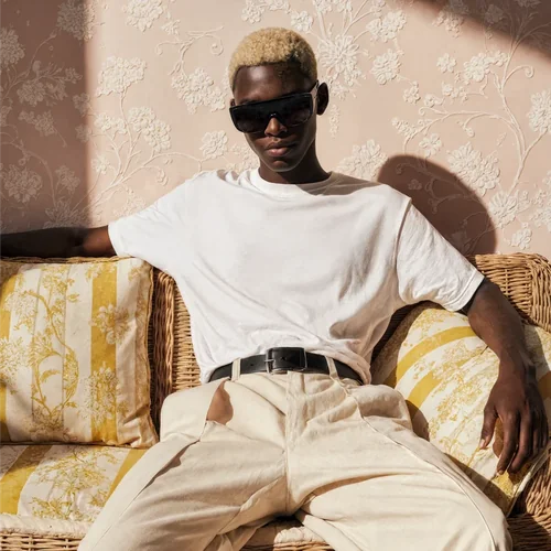 Stylish T-Shirt Mockup with Floral Background and Soft Colors