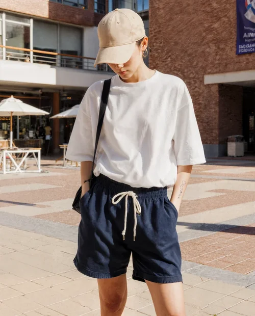 Casual Mockup of a T-Shirt in Urban Summer Setting