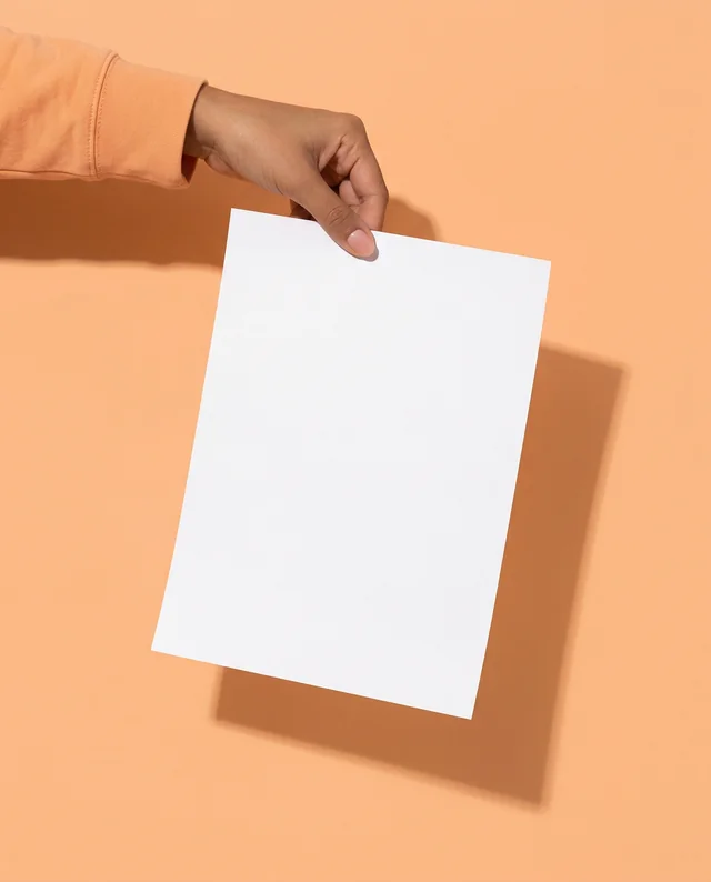 Modern Mockup of a Hand Holding a Blank Flyer