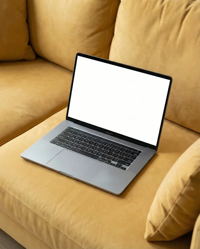 Stylish MacBook Mockup on Cozy Yellow Sofa