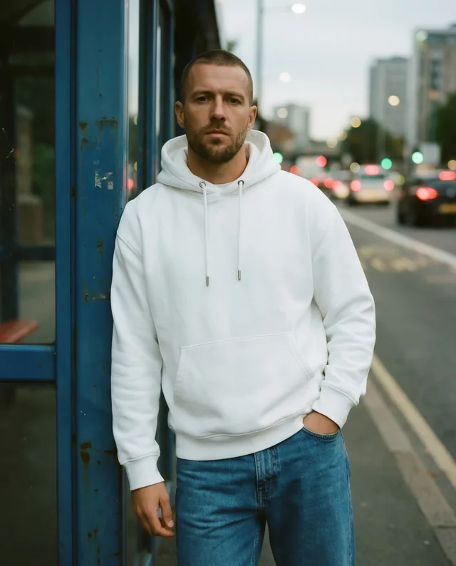 Stylish Hoodie Mockup of a Young Man in Urban Setting