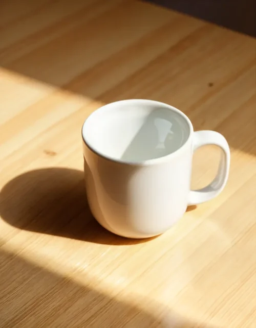 Elegant Mug Mockup with Warm Wooden Background and Colors