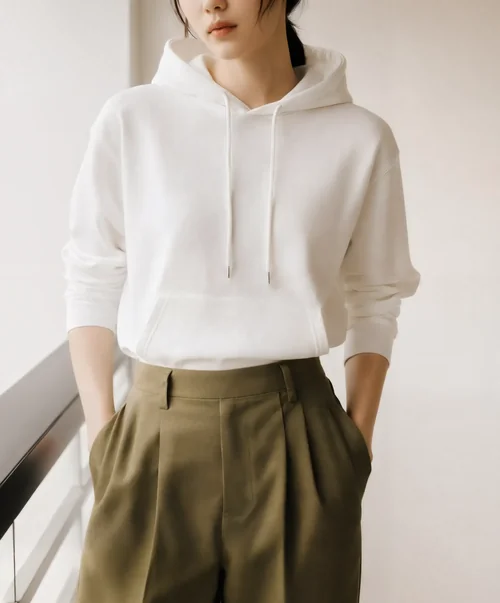 Cozy Hoodie Mockup of Young Woman by Large Window