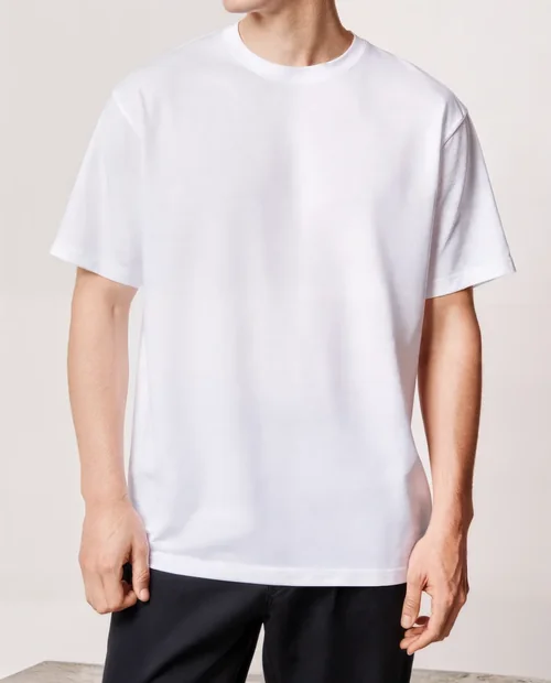 Mockup of a Stylish T-Shirt on a Young Male Model
