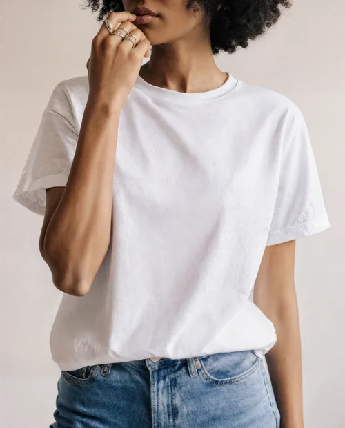 Stylish T-Shirt Mockup of a Young Woman