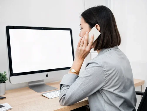 Modern Office Mockup with iMac and Professional Woman