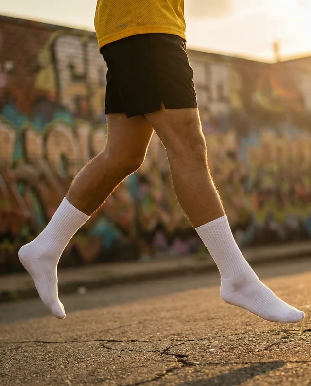 Dynamic Male Figure Mockup in Bright Socks and Jersey