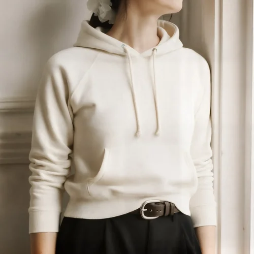 Cozy Hoodie Mockup of Young Woman in Soft Lighting