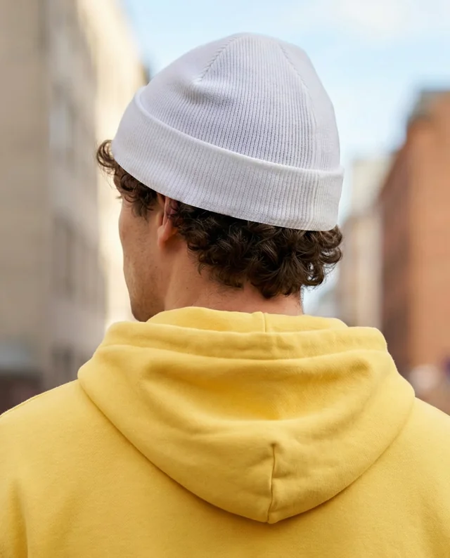 Cozy Young Man in Yellow Hoodie and White Beanie Mockup