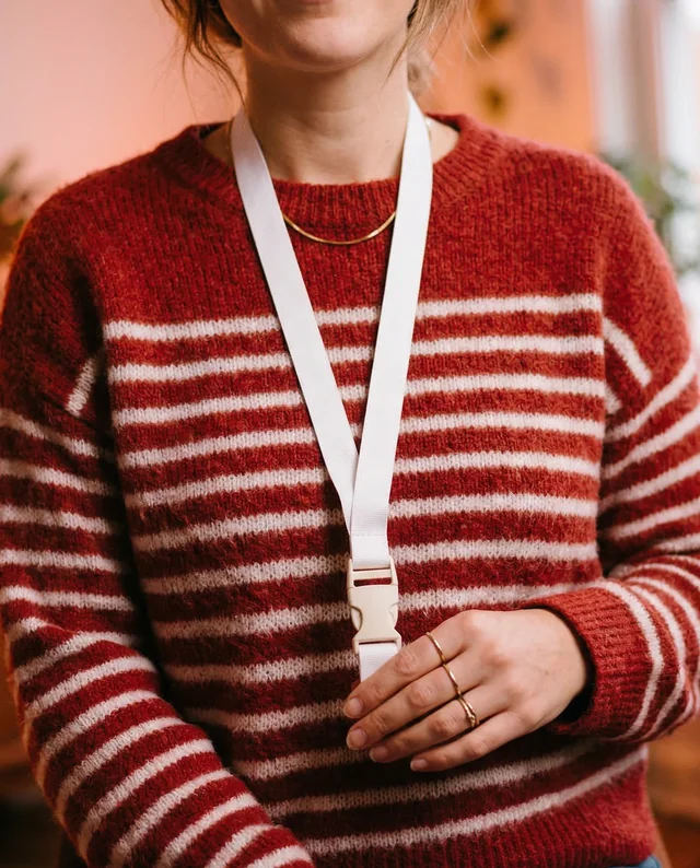 Cozy Indoor Mockup Featuring Woman with Lanyard
