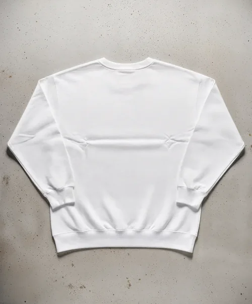 Mockup of a Classic White Sweatshirt on Concrete