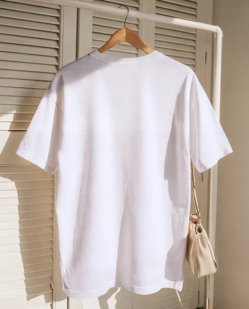 Minimalist T-Shirt Mockup on Wooden Hanger