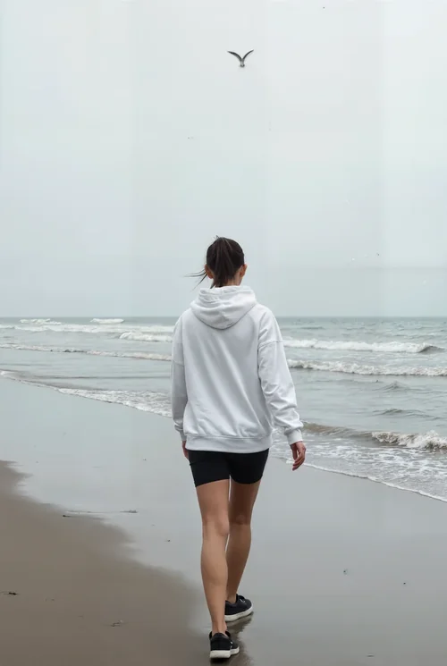 Serene Beach Mockup with Cozy Hoodie and Soft Colors