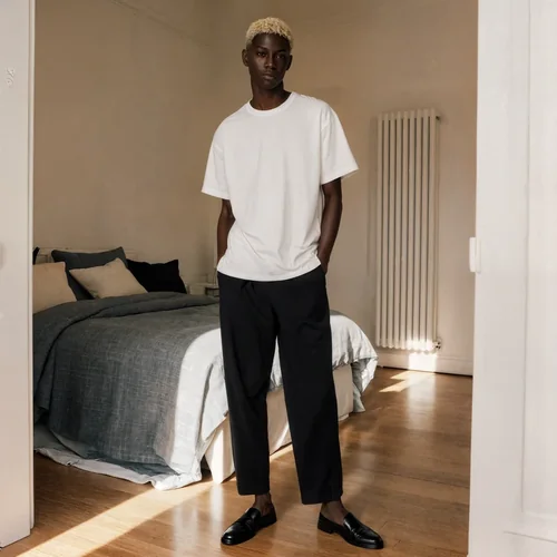 Mockup of T-Shirt in Bright Bedroom with Soft Colors