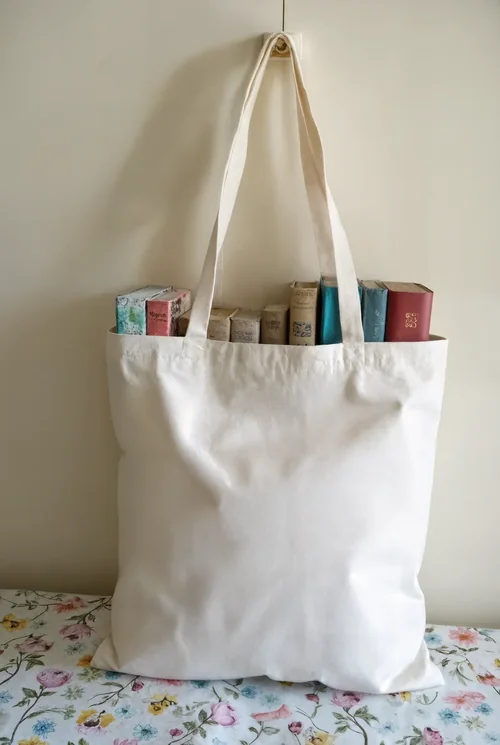 Elegant Mockup of a Vintage Tote Bag with Books