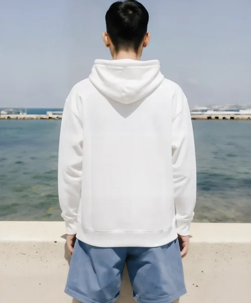 Serene Hoodie Mockup of a Young Man by the Coast