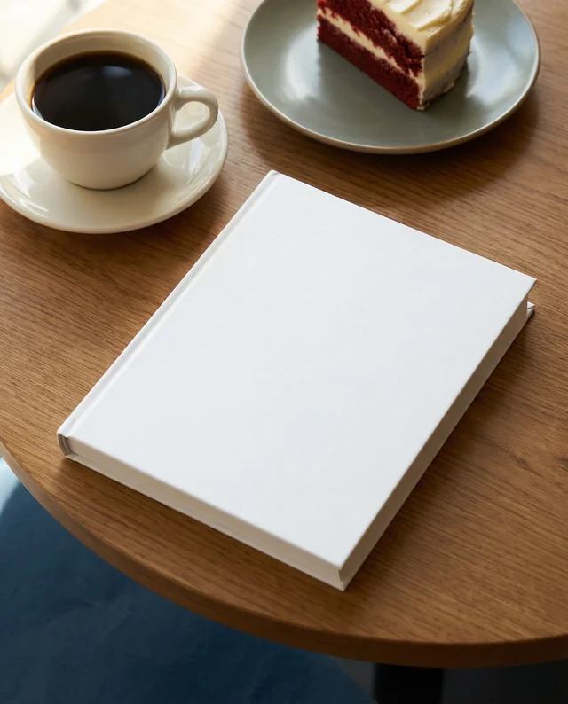 Cozy Café Mockup with Book and Coffee Delight