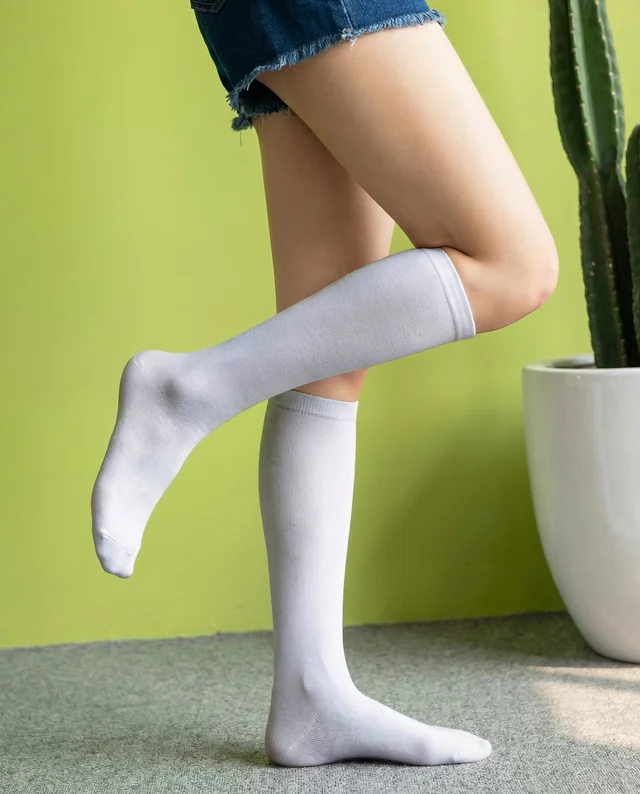 Chic Mockup of a Young Woman in Knee-High Socks