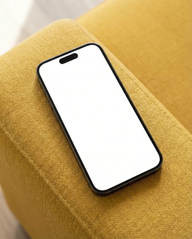 Modern iPhone Mockup on Vibrant Yellow Couch