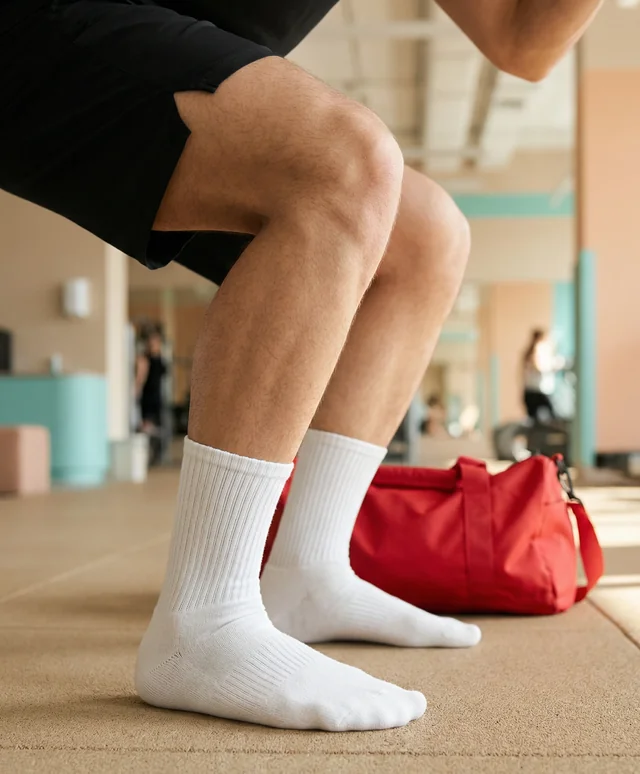 Dynamic Gym Mockup Featuring Young Man in Socks