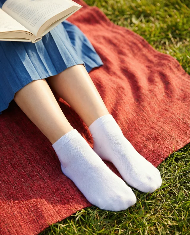 Charming Mockup of Relaxing Legs in Colorful Socks