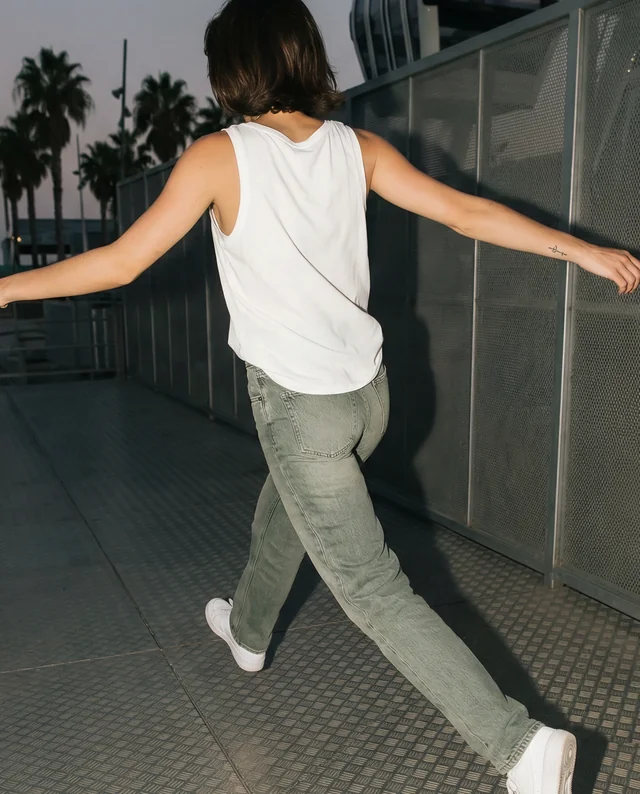 Confident Woman in Tank Top Mockup on Metal Walkway